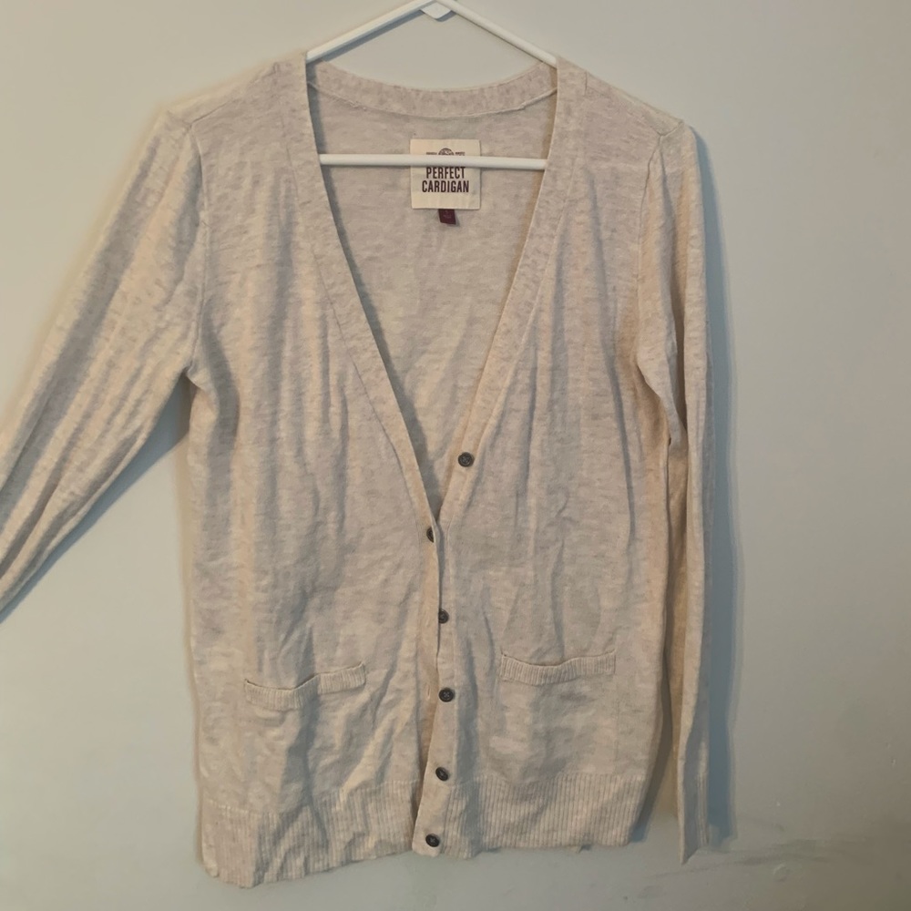 cream colored cardigan